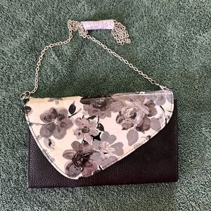 Black vintage bag with silver chain strap with gorgeous black and white flowers